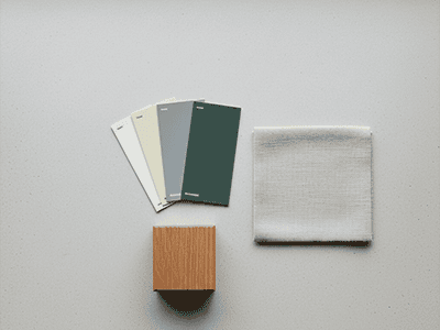 A mood board showing paint swatches, a fabric sample, and a timber finish.