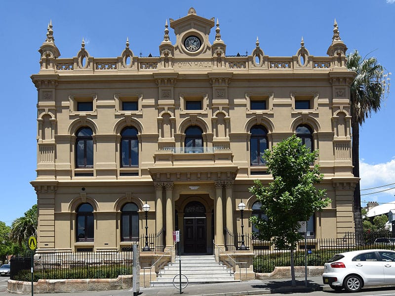 Painting the detailed facade of a grand Victorian terrace in Glebe, Sydney